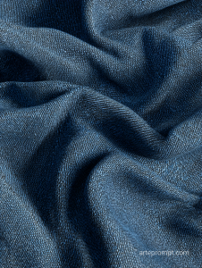 Rugged blue denim jeans texture with detailed seams and casual style, perfect for fashion design projects.
